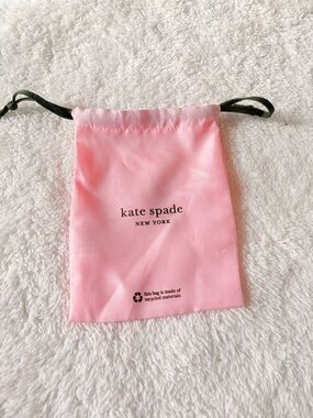 kate spade Pink Drawstring Pouch with Black Cord